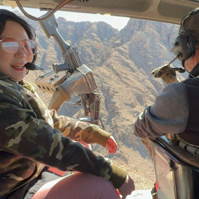 Guest preparing for upgraded door gunner shooting package