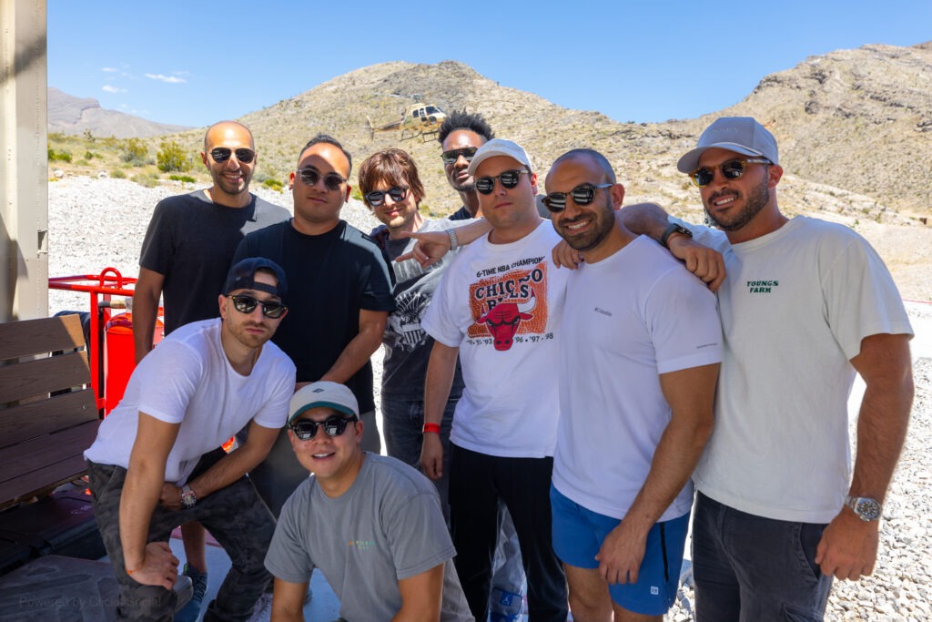 Group of men smiling after completing the Beast Mode shooting package with Gunship Helicopters in Las Vegas