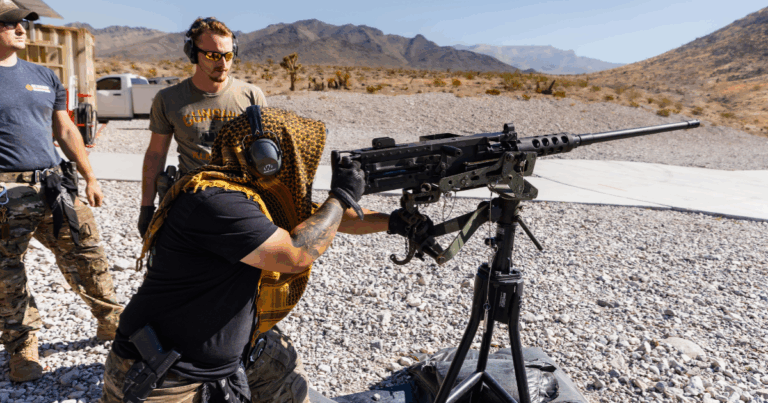 Guest safely firing Barrett .50 caliber under supervision of Range Safety Officers at Gunship Helicopters ground range in Las Vegas.