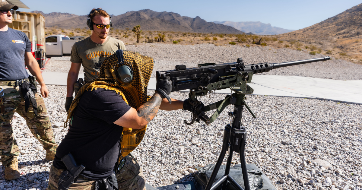 Guest safely firing Barrett .50 caliber under supervision of Range Safety Officers at Gunship Helicopters ground range in Las Vegas.