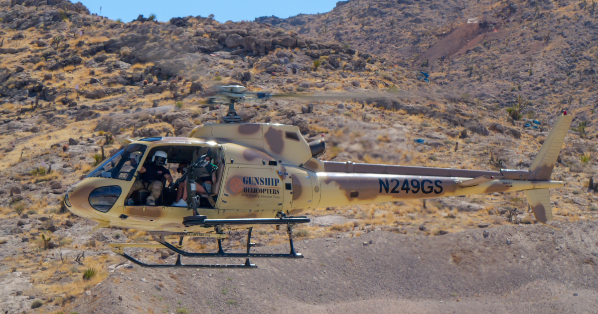 Veteran-led helicopter in flight during Gunship Helicopters aerial shooting adventure near Las Vegas Nevada