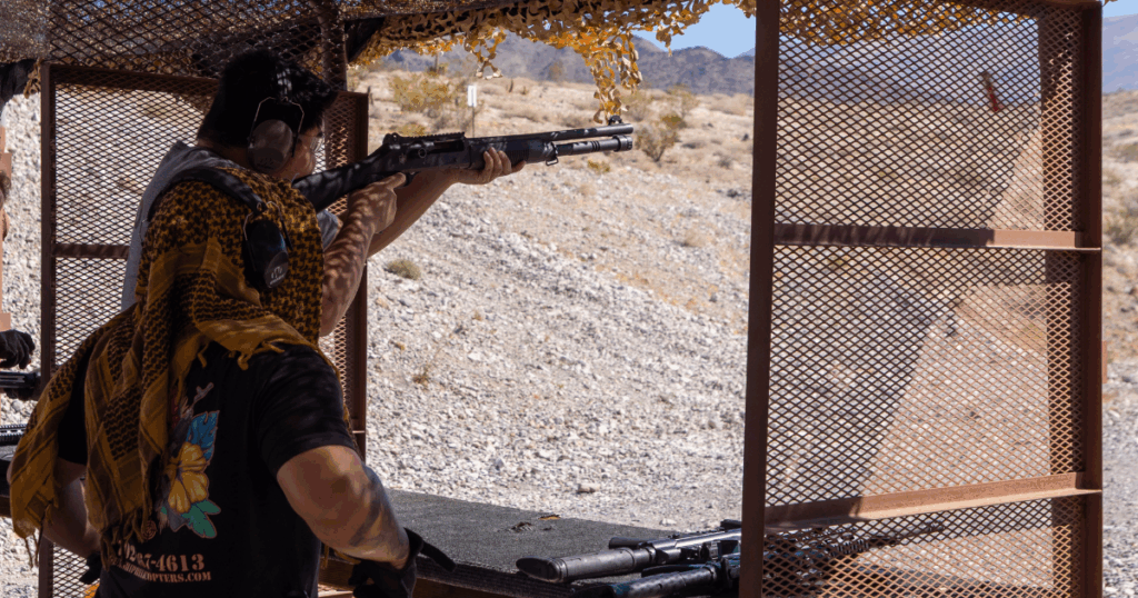 Veteran instructor showcasing Barrett .50 caliber at Gunship Helicopters range near Las Vegas, Nevada
