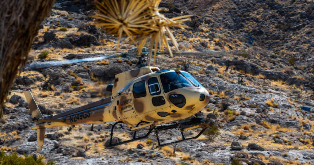 Gunship Helicopters flying over the Nevada desert during a Las Vegas adventure experience for veterans and tourists