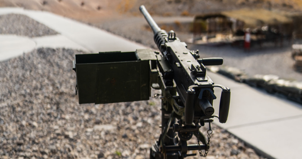 Mounted M240 machine gun at an outdoor Las Vegas shooting range for veterans and first responders visiting Gunship Helicopters