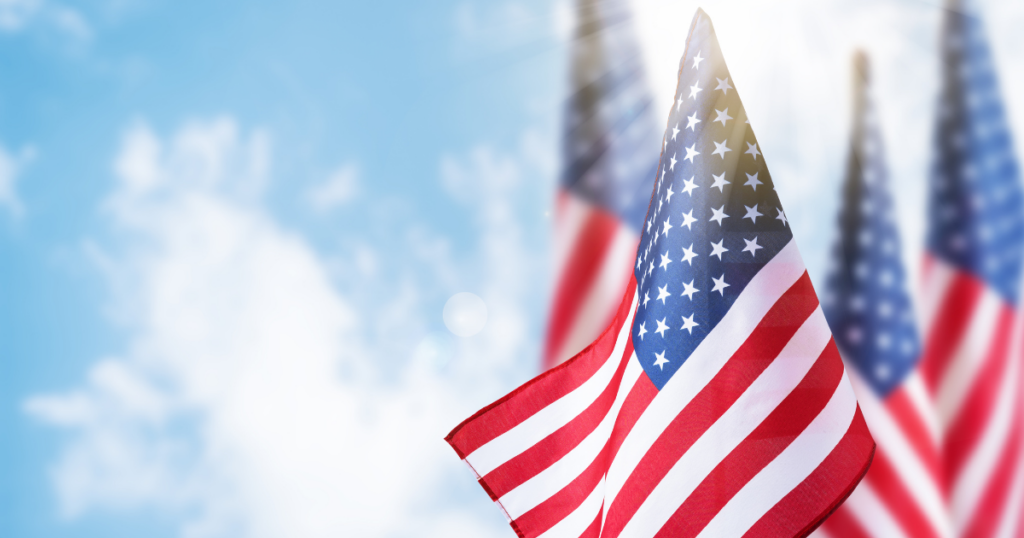American flags honoring veteran stories in Las Vegas and the military service experiences behind the Gunship Helicopters mission