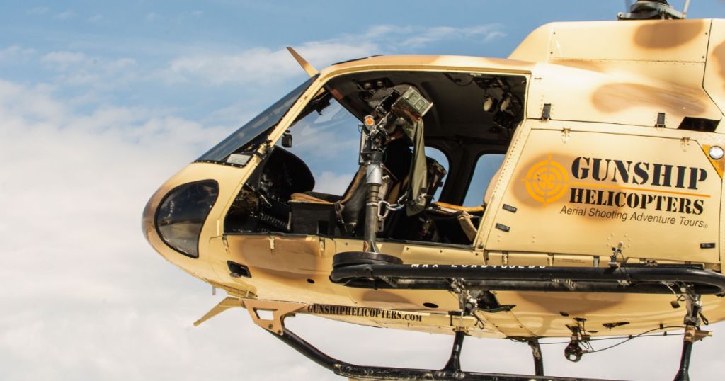 Range safety officer guiding a helicopter shooting experience in Las Vegas with fully automatic machine guns and desert adventure safety preparation